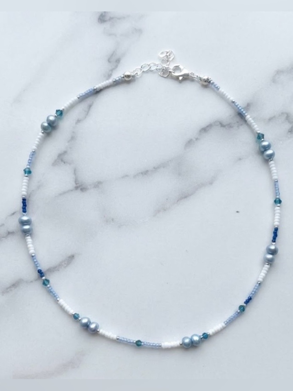 Freshwater Pearl Necklace with blue and white seed beads and sliver accent.